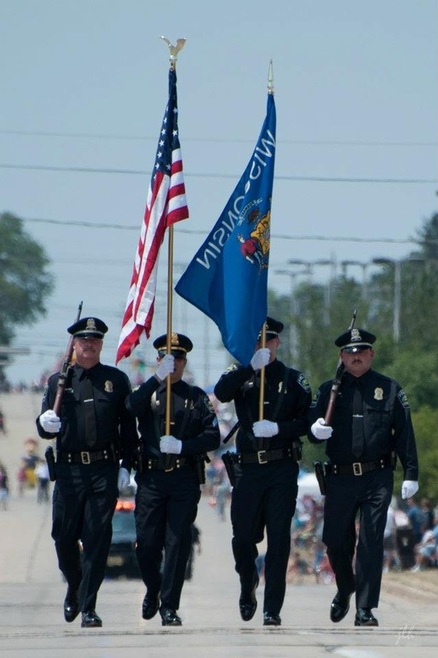 Honor Guard in 4th of July Parade. I'm with the WI flag.